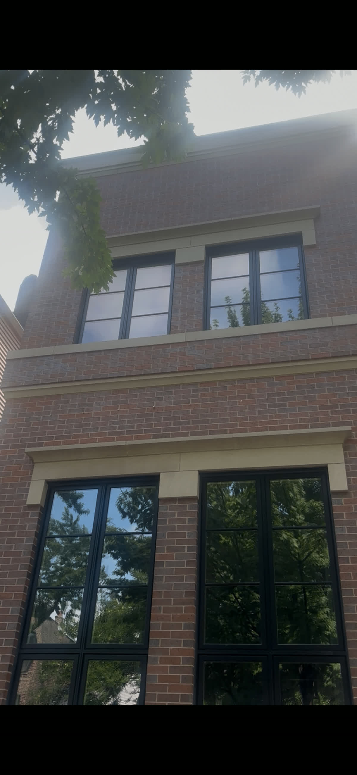 Spotless windows on a Chicago graystone home